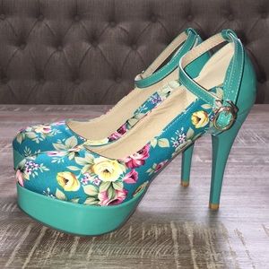 Red soled (Not CL's) teal platform heels